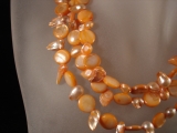 Muscheln und Perlen lang orange